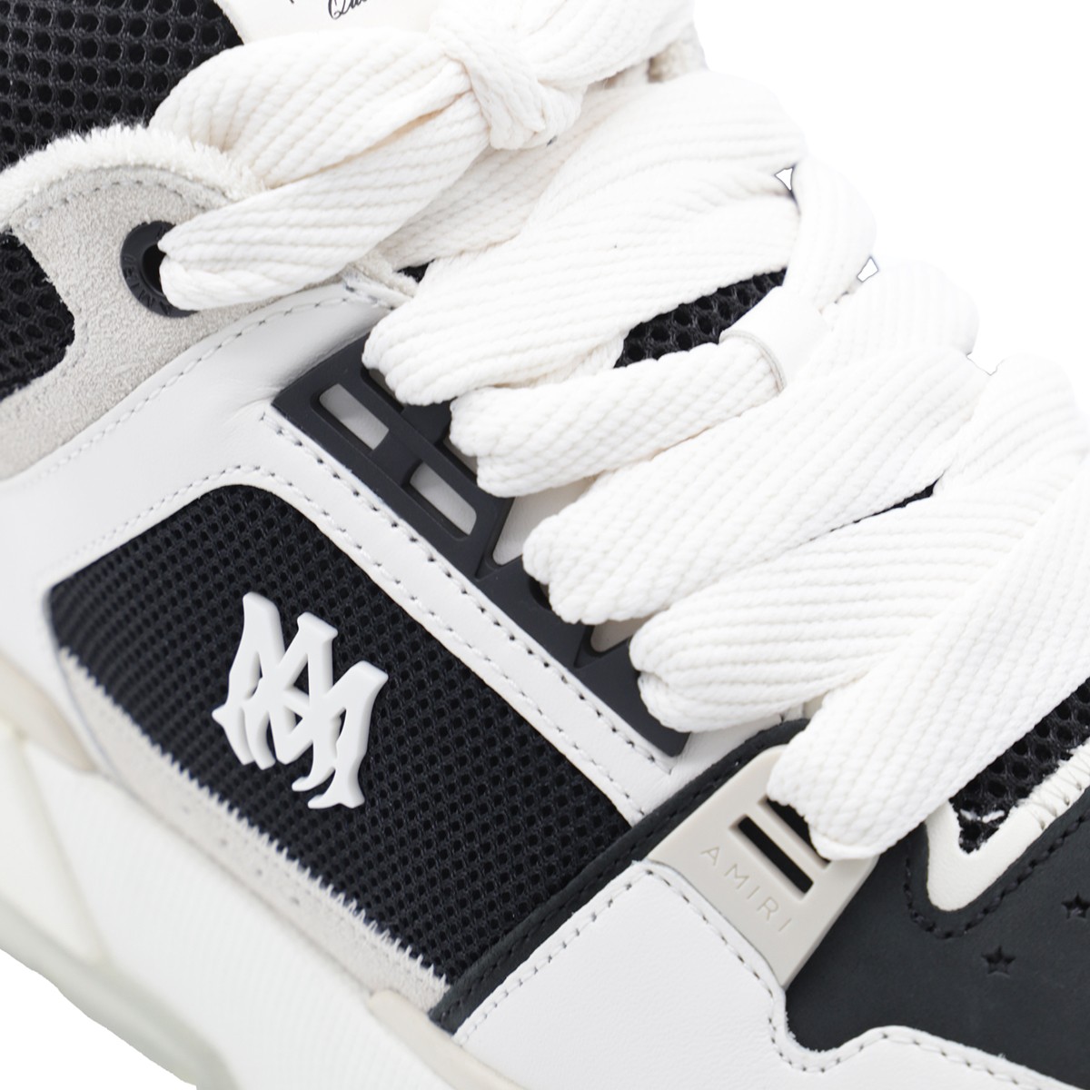 BLACK AND WHITE LEATHER SNEAKERS