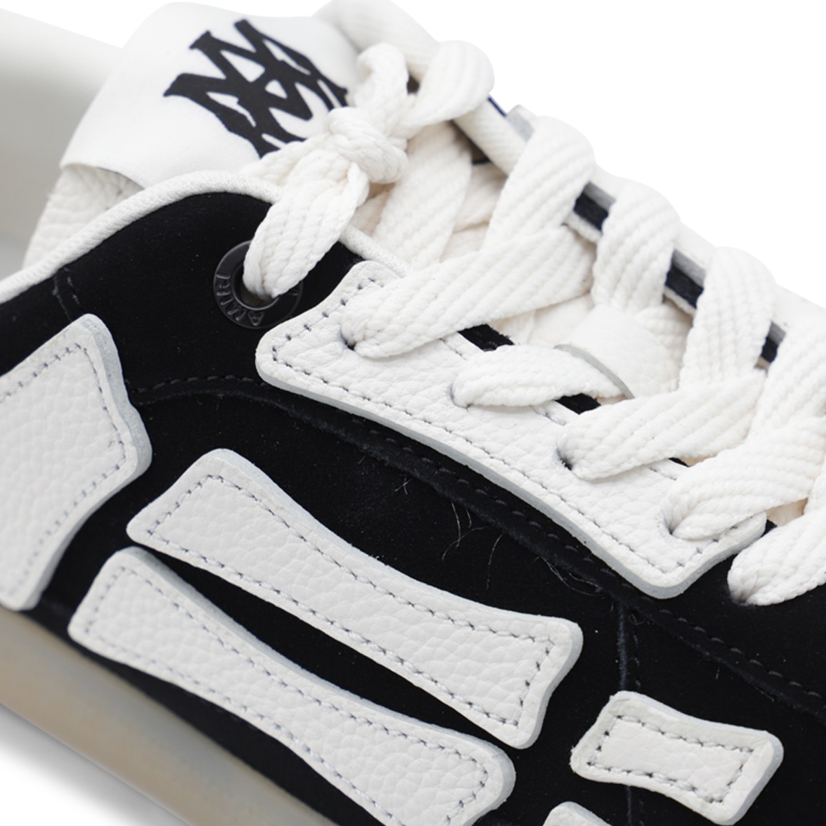 BLACK AND WHITE LEATHER PACIFIC BONES...