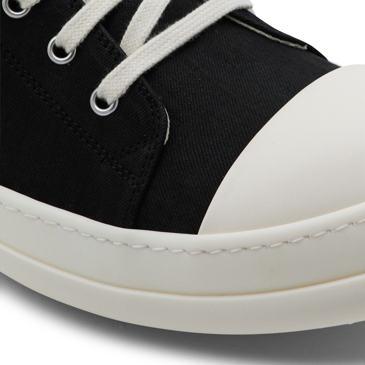BLACK AND WHITE LEATHER LOW SNEAKERS