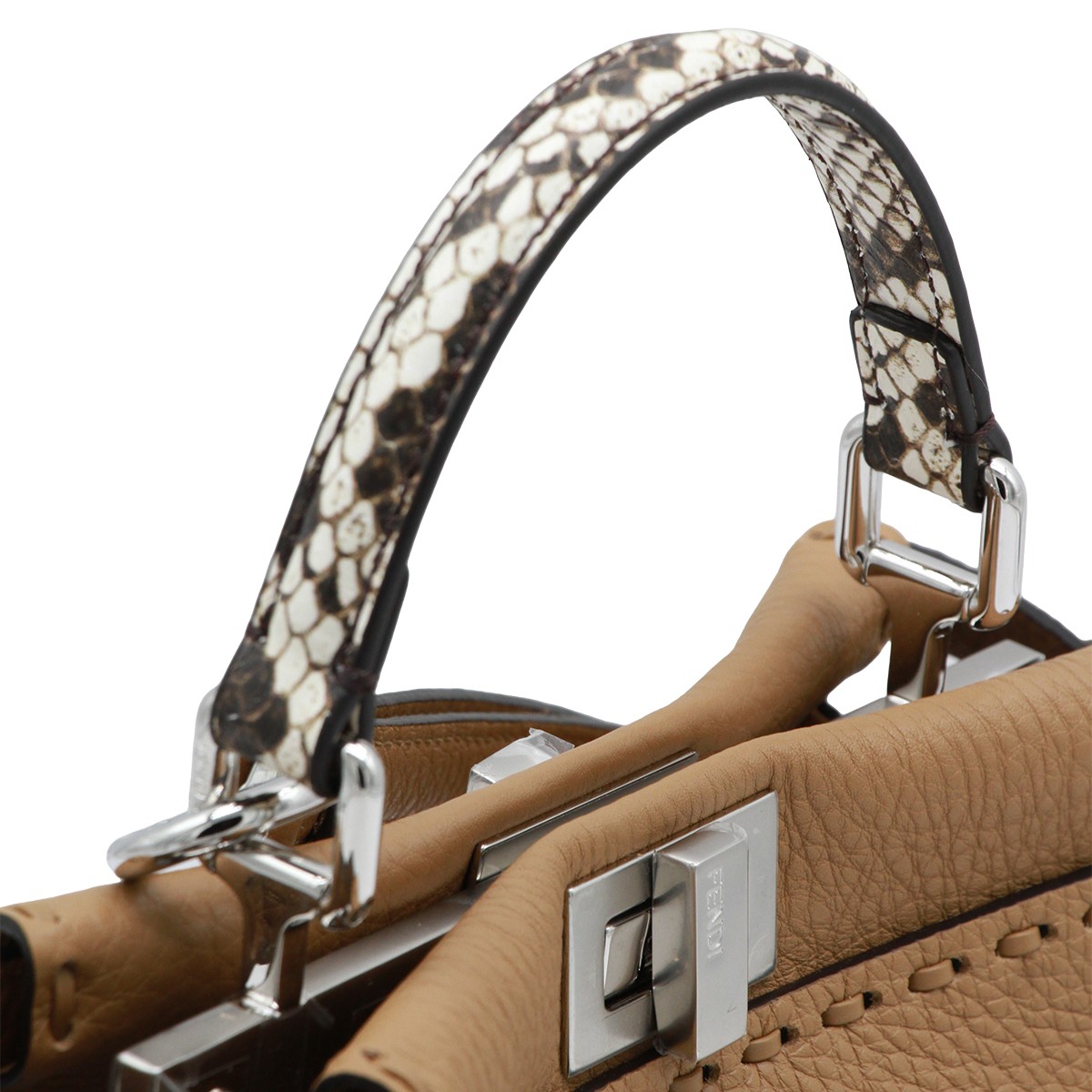 BEIGE LEATHER PEKABOO ISEEU TOP...