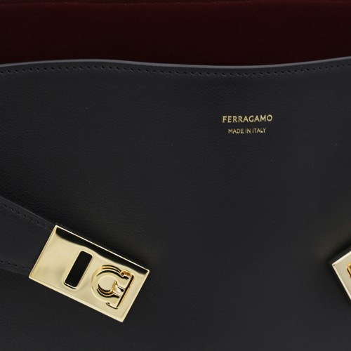 BLACK LEATHER HUG S TOP HANDLE BAG