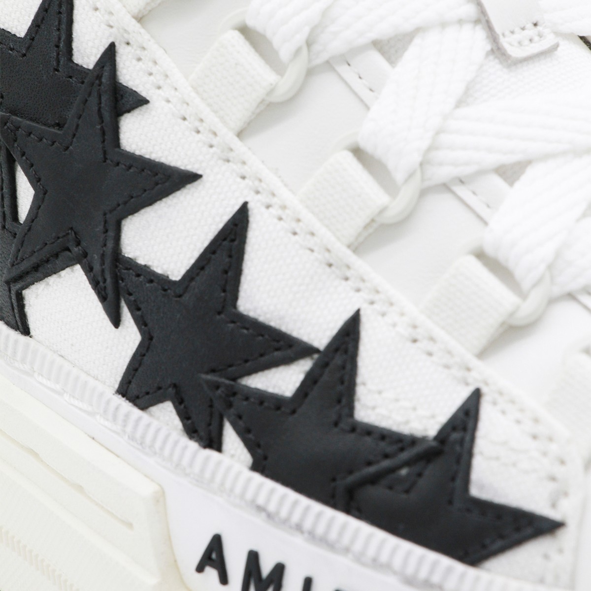 WHITE AND BLACK LEATHER STARS COURT...