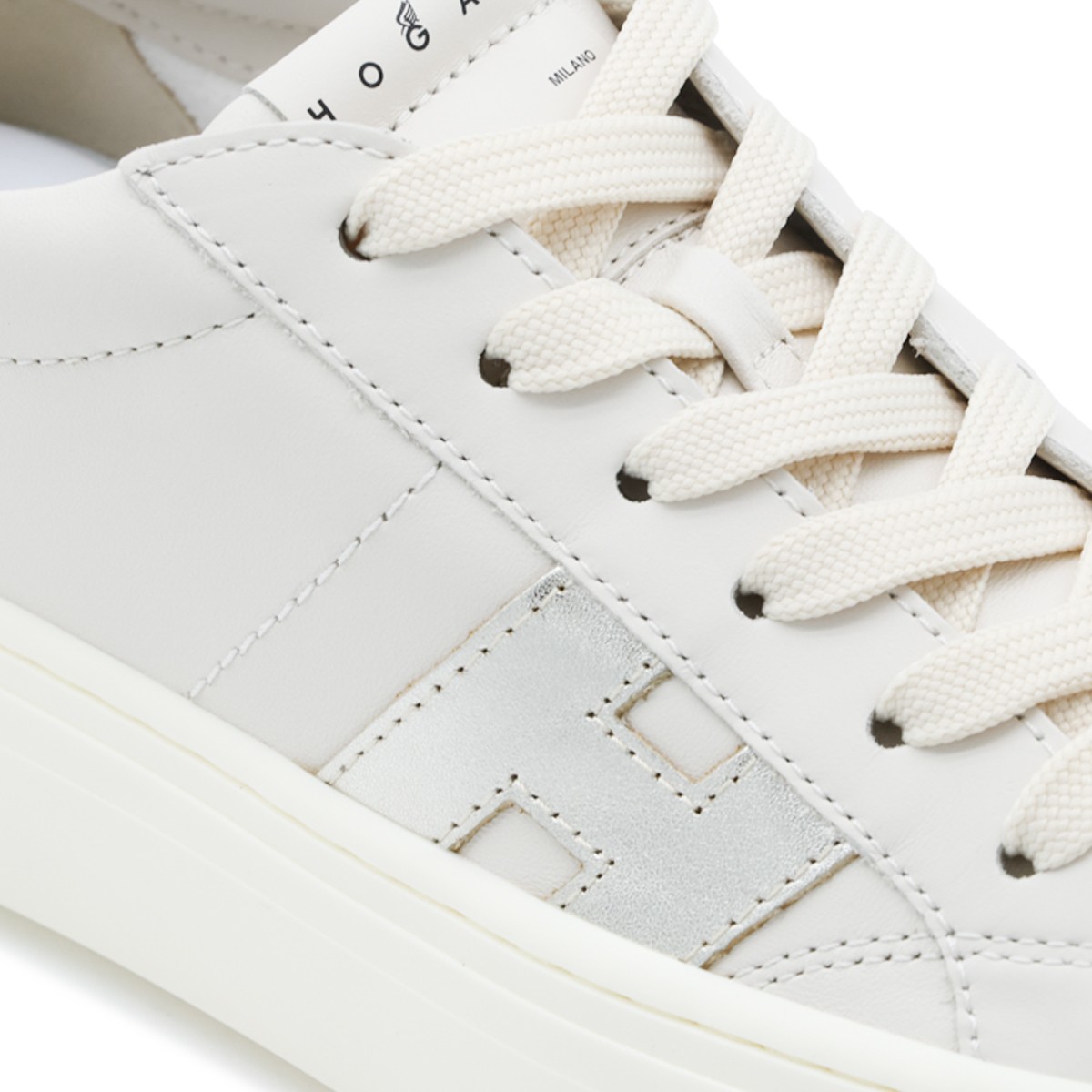 BEIGE AND SILVER LEATHER CROSSWIND...