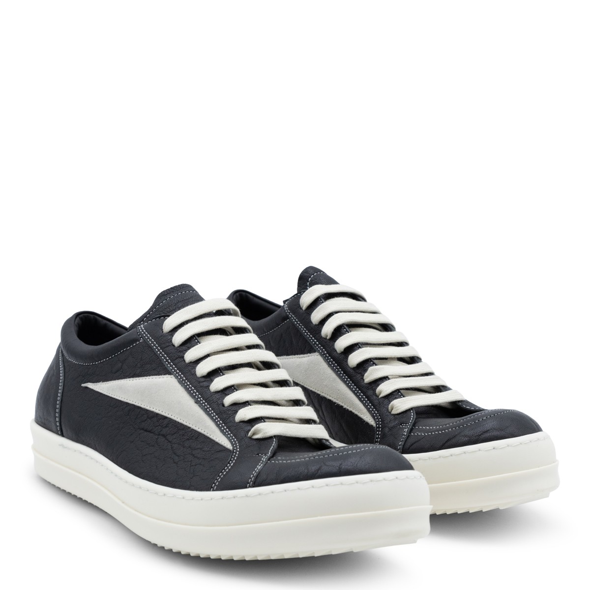 BLACK AND WHITE LEATHER VINTAGE SNEAKERS