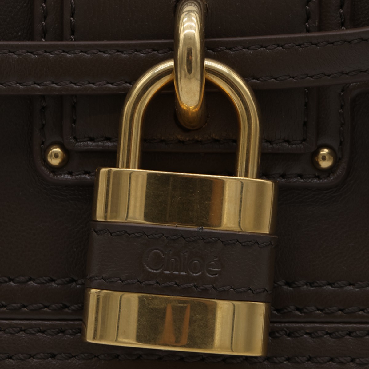 BROWN LEATHER PADDINGTON SLING BAG