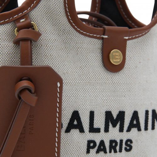 BEIGE CANVAS AND BROWN LEATHER HANDLE BAG