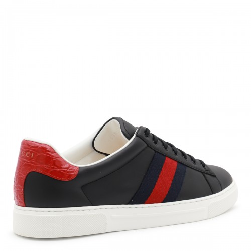 BLACK AND RED LEATHER SNEAKERS