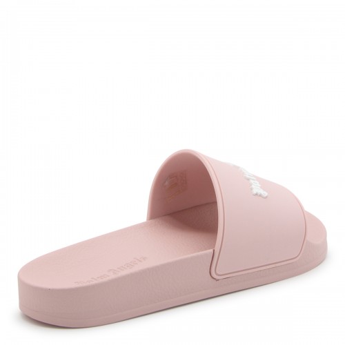 PINK AND WHITE RUBBER SLIDES