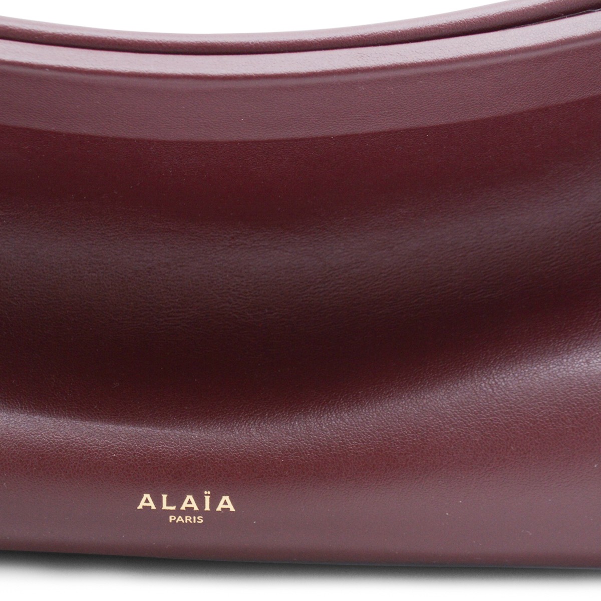 RED LEATHER EAST WEST MEDIUM... RED LEATHER EAST WEST MEDIUM...