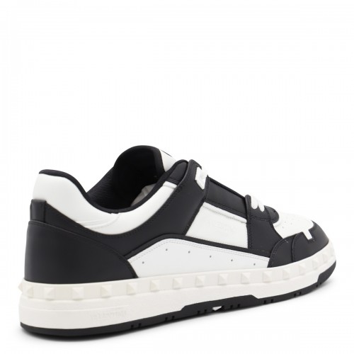 BLACK AND WHITE LEATHER SNEAKERS