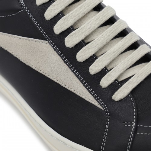 BLACK AND WHITE LEATHER VINTAGE SNEAKERS